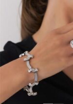 BRACELETE EM CURVAS E ZIRCONIAS - RODIO BRANCO - Imagem 2